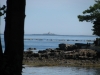 Lighthouse from walking path at Bar Harbor