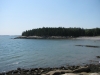 Looking across the cove where the sand beach is on the right