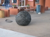 Ball of bicycle tire tubes in front of bike rental shop